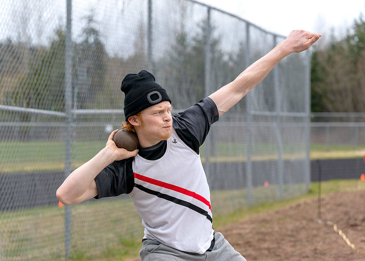 East Jefferson’s Gage Berry puts the shot a personal best of 35 feet, 7 inches during a meet Saturday at Blue Heron Middle School against the Klahowya Eagles. Gage finished second to teammate Anson Jones, who went 37-4 1/2. (Steve Mullensky/for Peninsula Daily News)