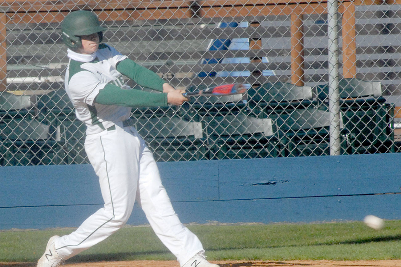 Keith Thorpe/Peninsula Daily News
Port Angeles' Jake Felton bats in the second inning against Sequim on Wednesday at Port Angeles Civic Field.