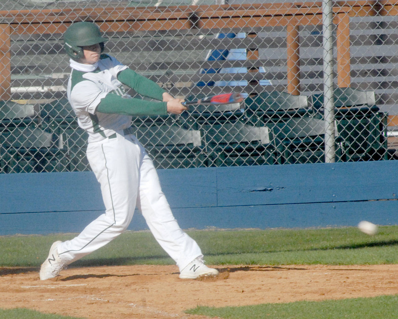 Port Angeles’ Jake Felton bats in the second inning against Sequim on Wednesday at Port Angeles Civic Field. (Keith Thorpe/Peninsula Daily News)