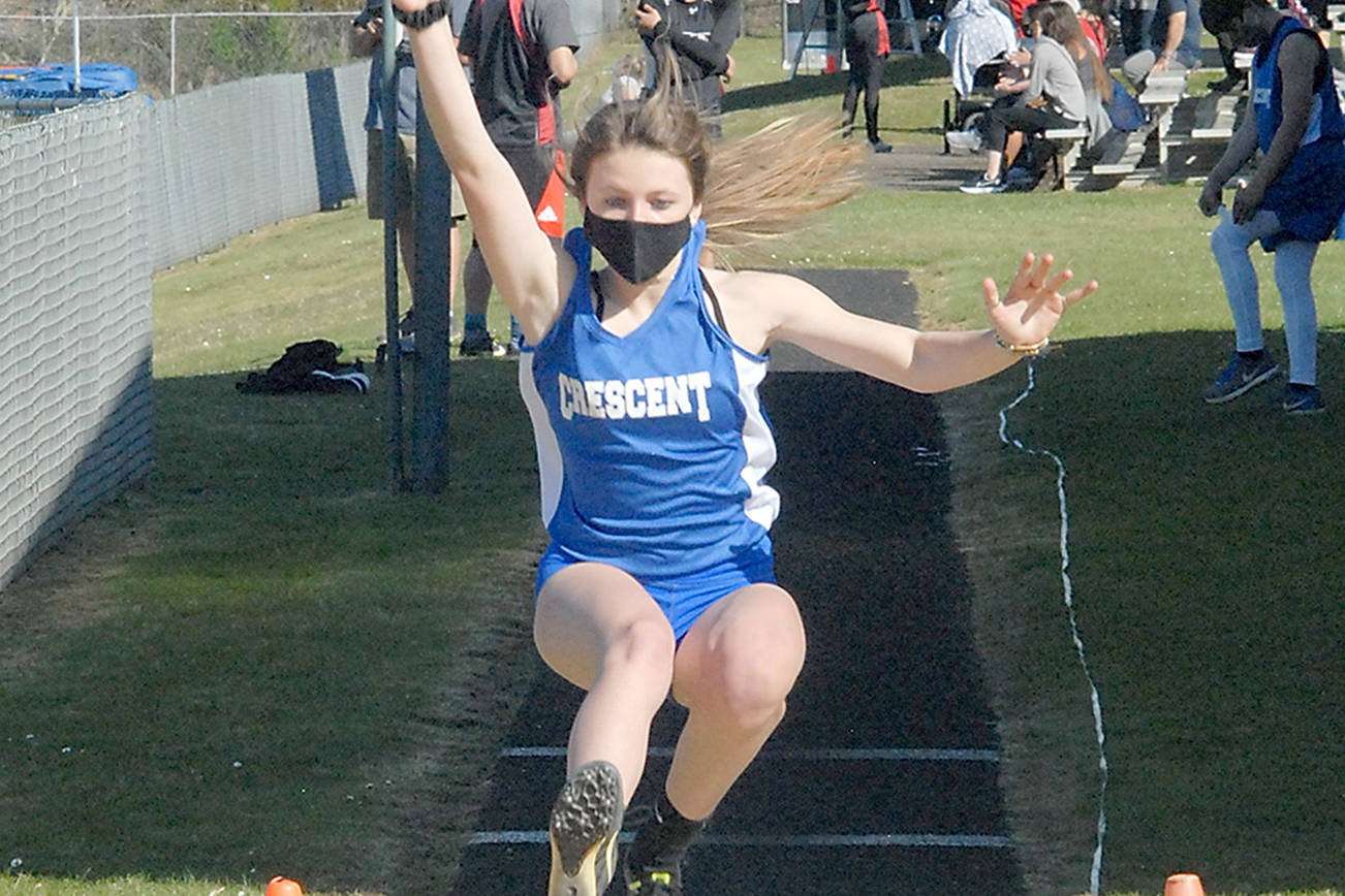 Keith Thorpe/Peninsula Daily News
Crescent's Makiah Clark competes in the long jump on Friday in Joyce.