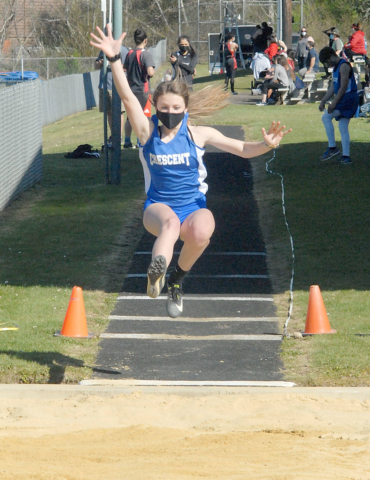 Crescent’s Makiah Clark competes in the long jump on Friday in Joyce. Clark tied for first place. (Keith Thorpe/Peninsula Daily News)