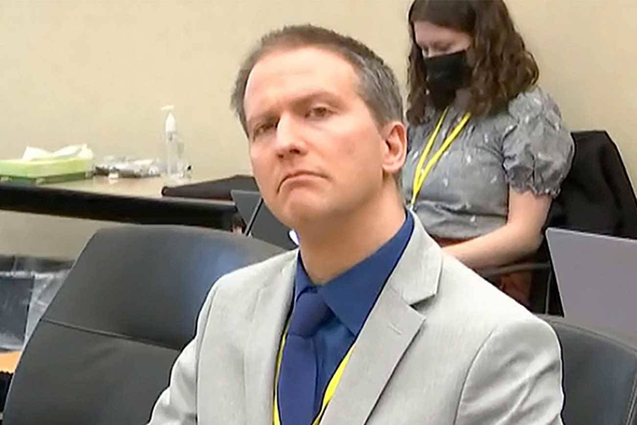 In this image from video, former Minneapolis police Officer Derek Chauvin listens while his defense attorney Eric Nelson gives closing arguments as Hennepin County Judge Peter Cahill presides Monday, April 19, 2021, in the trial of Chauvin at the Hennepin County Courthouse in Minneapolis. Chauvin is charged in the May 25, 2020, death of George Floyd. (Court TV via The Associated Press)