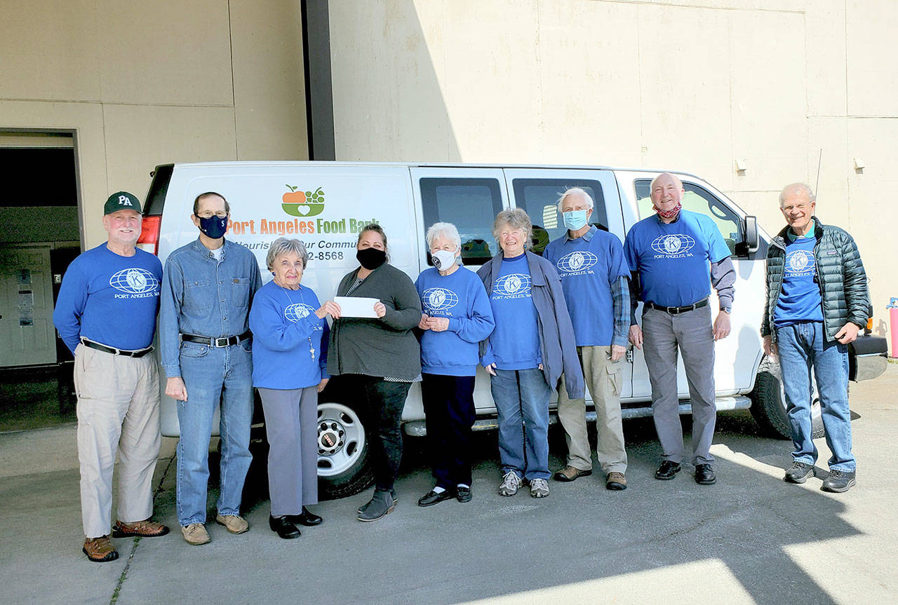 Pictured, from left to right, are Carl Gay, Tim Crowley, Jerrie Tiderman, Emily Dexter, Peggy Norris, Carol McLean, Dick McLean, Lloyd Eisenman and Mark Hannah.