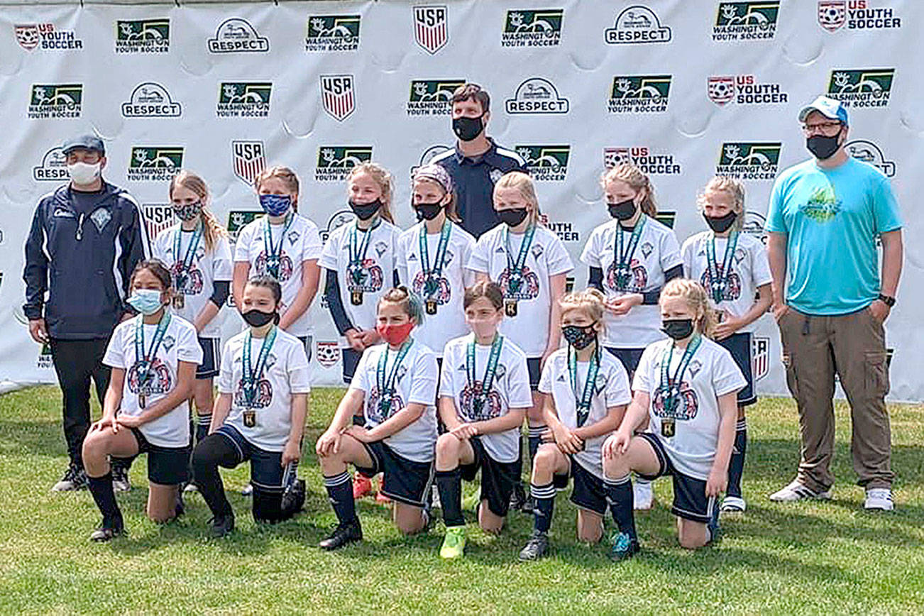 Photo courtesy of Jessica Lancaster 
From left, back row, coach Jay Marazon, Stella Fradkin, Madison Wilkinson, Emma Desjardin, Maddie Walton, assistant coach Rob Walton, Mariah Traband, Alayna Marazon, Lilly Lancaster, and assistant coach Jack Waknitz. From left, front row, Brooklynn Schmidt, Madigan Ordona, Emma Rhodes, Cela Waknitz, Lila Nix and Peyton Smith.