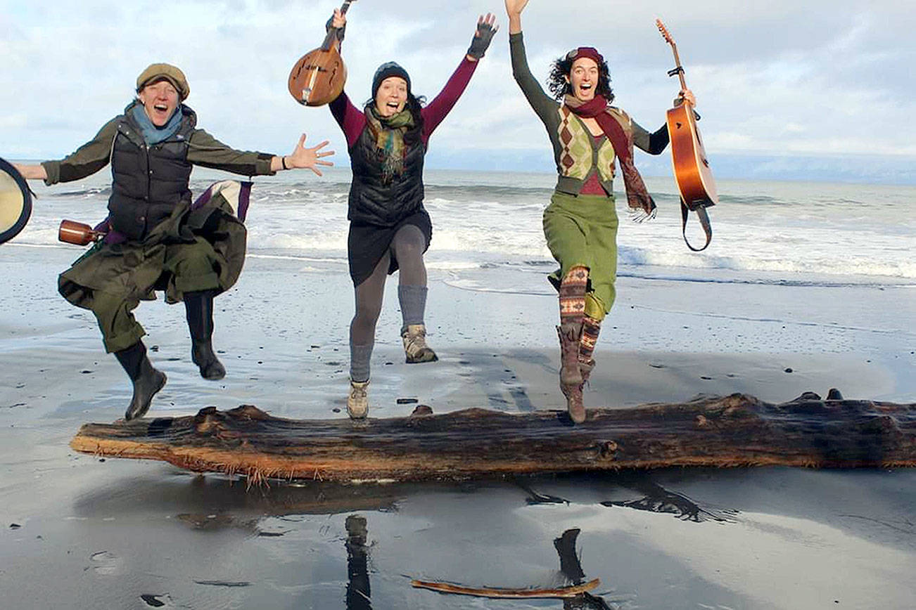 The band Three Wheels Turning -- from left, Aimée Ringle, Micaela Kingslight and Samara Jade -- will bring harmonies, strings and percussion to the Keg & I in Chimacum on Saturday. photo by Terry Du Beau