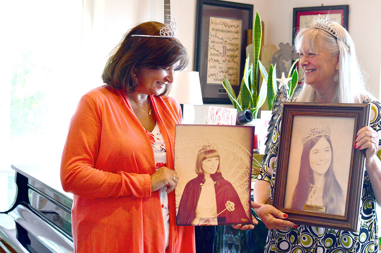 1978 Rhododendron Festival queen Ann DeLeo Waters, left, and her sister, 1973 Rhody queen Carlene DeLeo Dahlman, are the self-described “old Rhody queens” who are hosting a fundraiser Friday night at the Wheel-In Motor Movie in Port Townsend. (Diane Urbani de la Paz/Peninsula Daily News)
