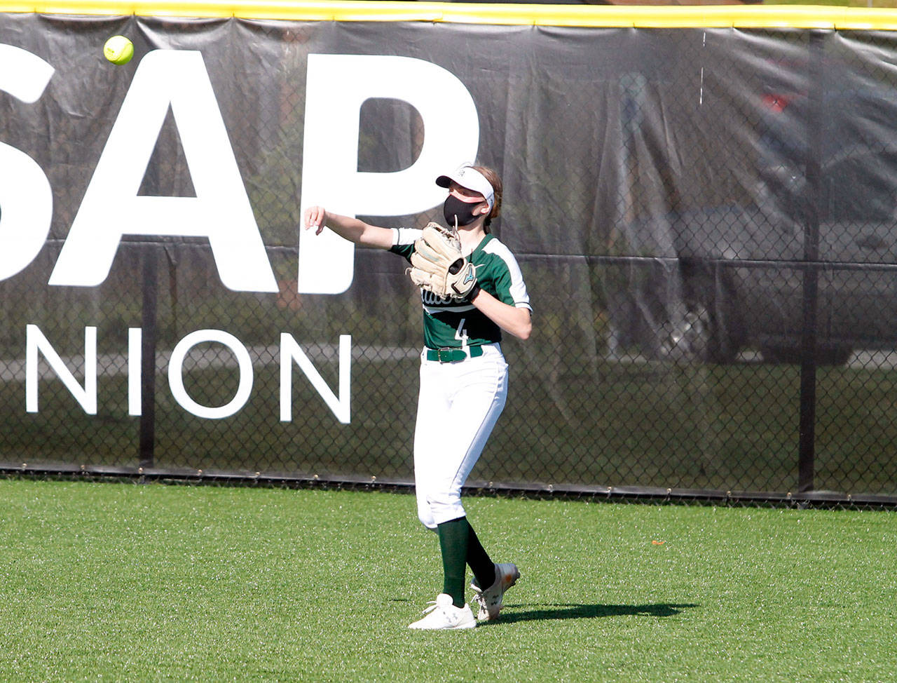 Port Angeles’ Teagan Clark makes the throw in from right field after a hit at the 18th Kitsap Athletic Roundtable Softball Showcase in Silverdale. Clark was named National team MVP after striking out four in three scoreless innings on the mound as the Nationals rallied for an 11-7 win over the Americans. (Mark Krulish/Kitsap News Group)