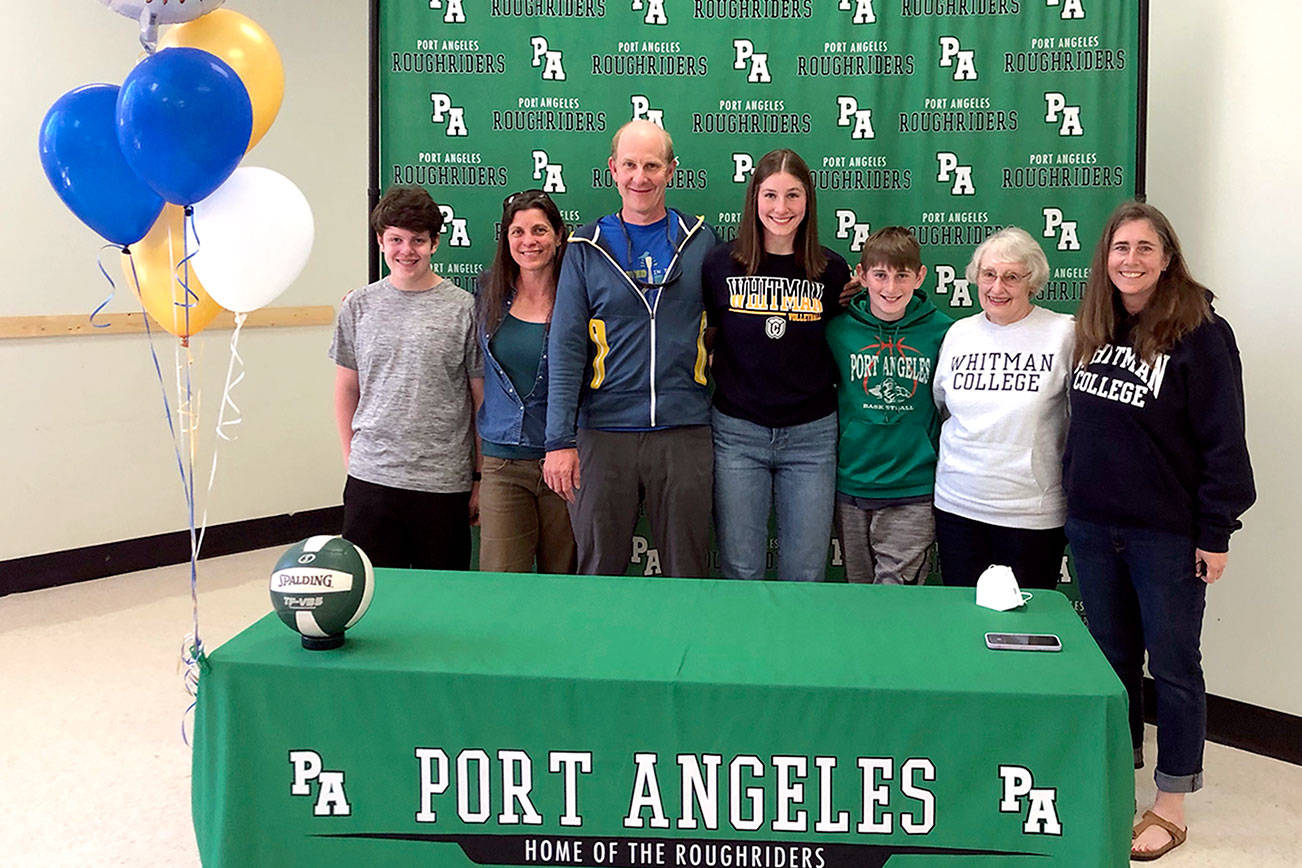 Port Angeles senior Ava Brenkman, fourth from left, signed a letter of intent as an invited walk-on to play college volleyball for Whitman College in Walla Walla. Brenkman was joined by family members, including her dad Sam Brenkman, third from left, and mom Katie Marks, far right.