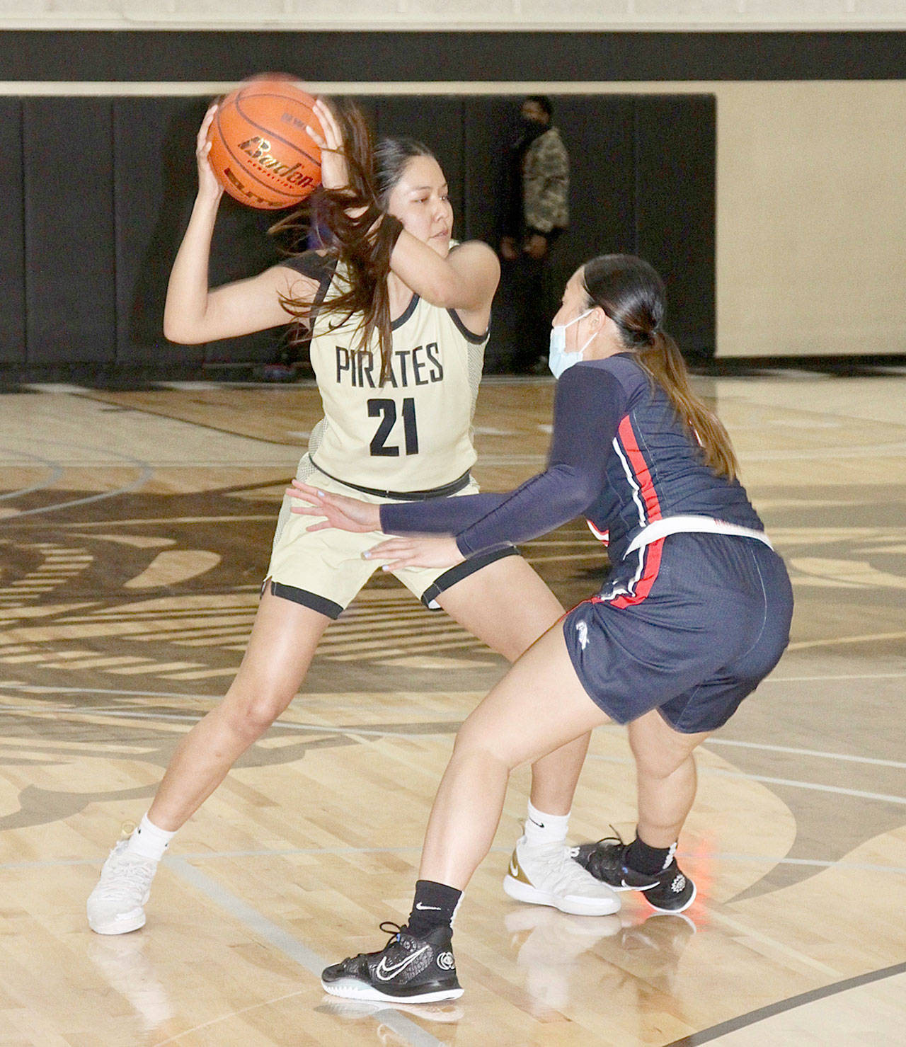 Tasiah Little of the Peninsula College women’s basketball team is guarded by Bellevue’s Keani Midel on Monday in Port Angeles. (Dave Logan/for Peninsula Daily News)