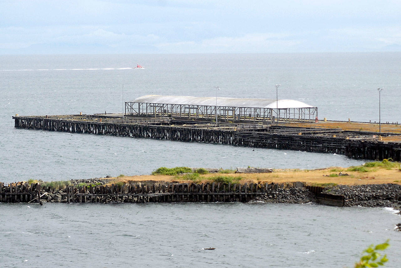The dock at the former Rayonier Mill east of downtown Port Angeles, shown on Saturday, is scheduled to be dismantled beginning in mid-June. (Keith Thorpe/Peninsula Daily News)