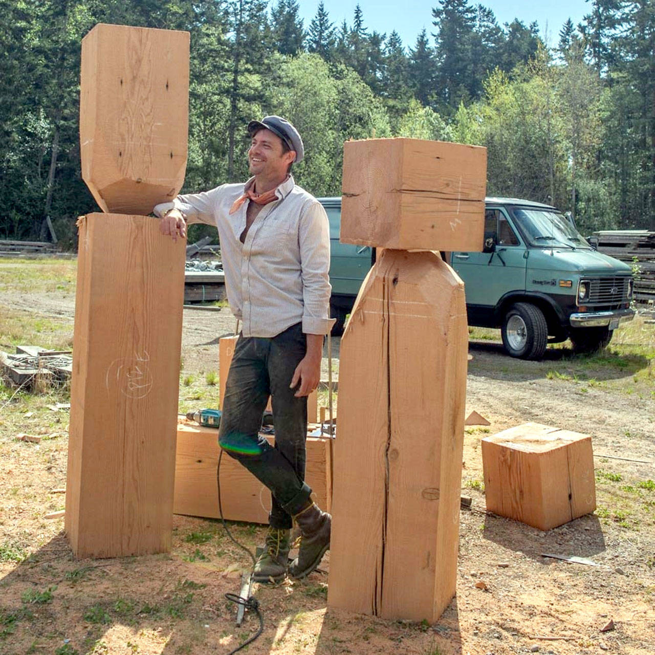 Port Townsend artist Jonah Trople sculpted the city’s Creative District “art markers” from local fir. The wayfinding markers will be cause for celebration at five sites around town this Tuesday at 5:15 p.m. (photo courtesy PT Main Street Program)