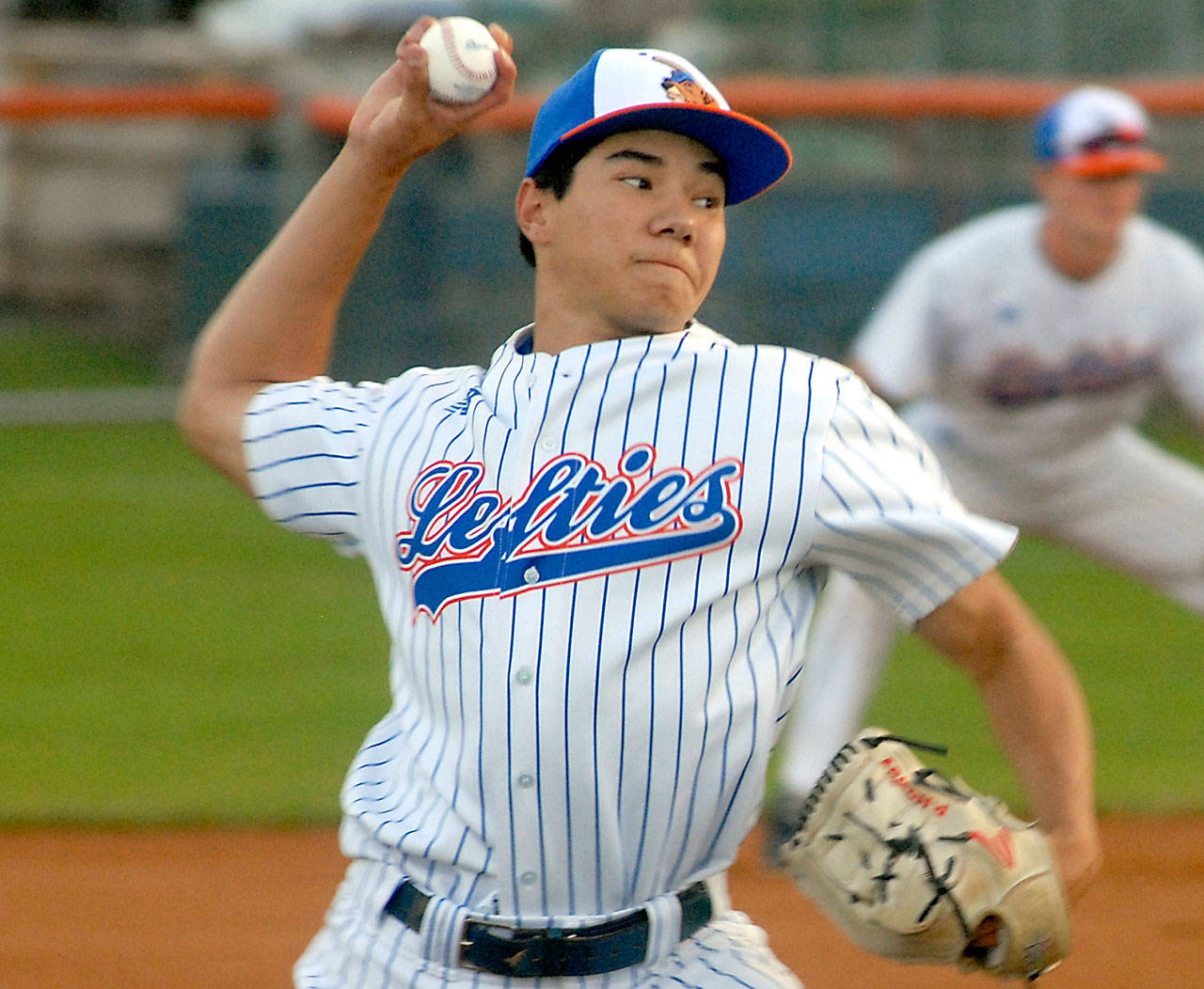 Lefties pitcher Preston Howey throws in the first inning of Tuesday night’s game against the Bellingham Bells at Port Angeles Civic Field. (Keith Thorpe/Peninsula Daily News)