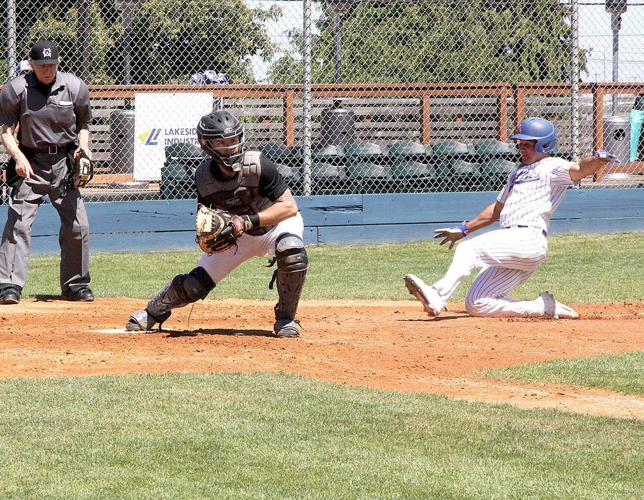 Richie Amavizca of the Lefties is forced out at home on a bases loaded infield hit against Driveline on Sunday. (Dave Logan/for Peninsula Daily News)