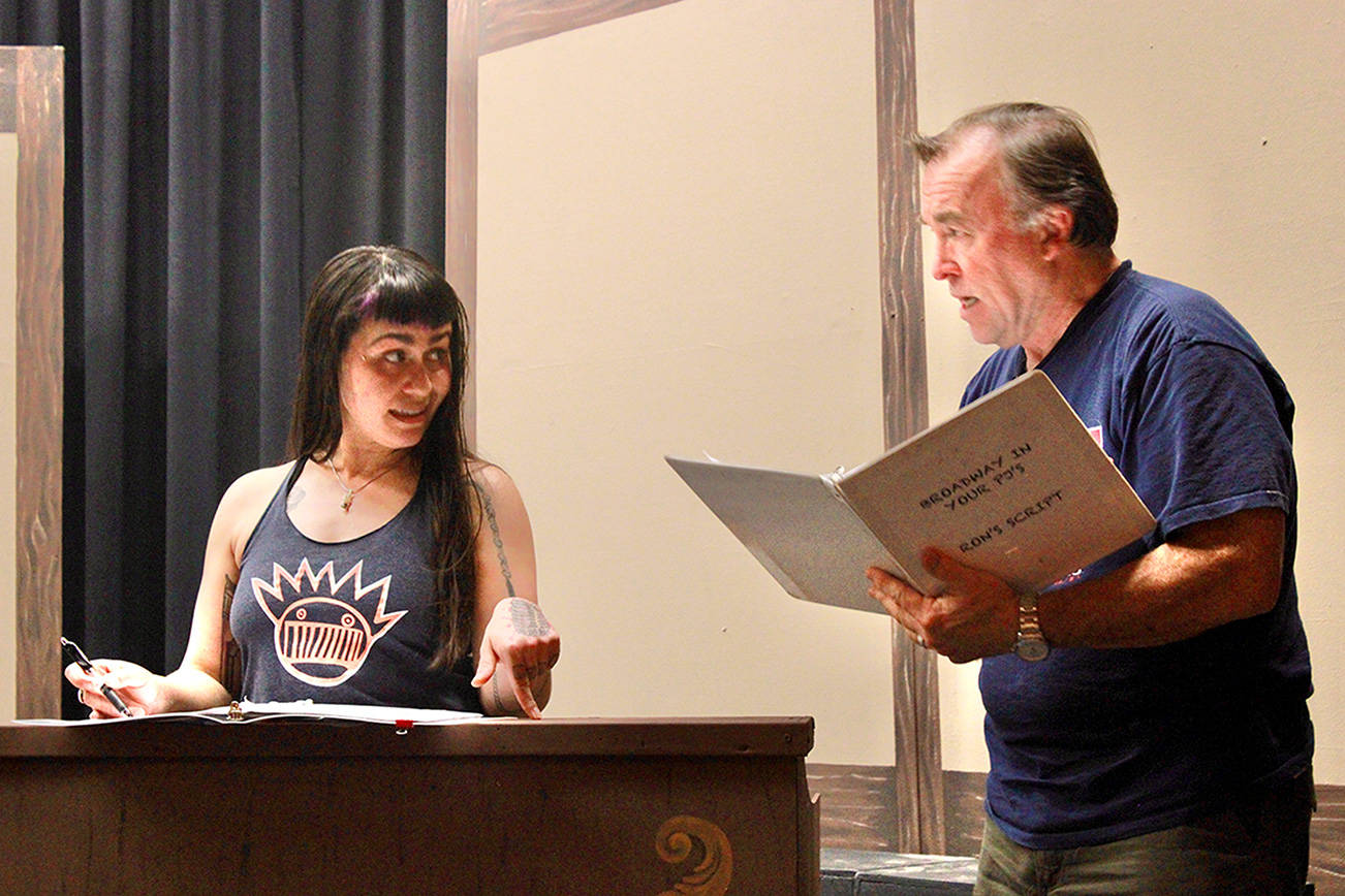 Olympic Theatre Arts newcomer Ashley Burton rehearses with veteran actor and director Ron Graham for the late Jim Guthrie’s “Searching for a Heart."