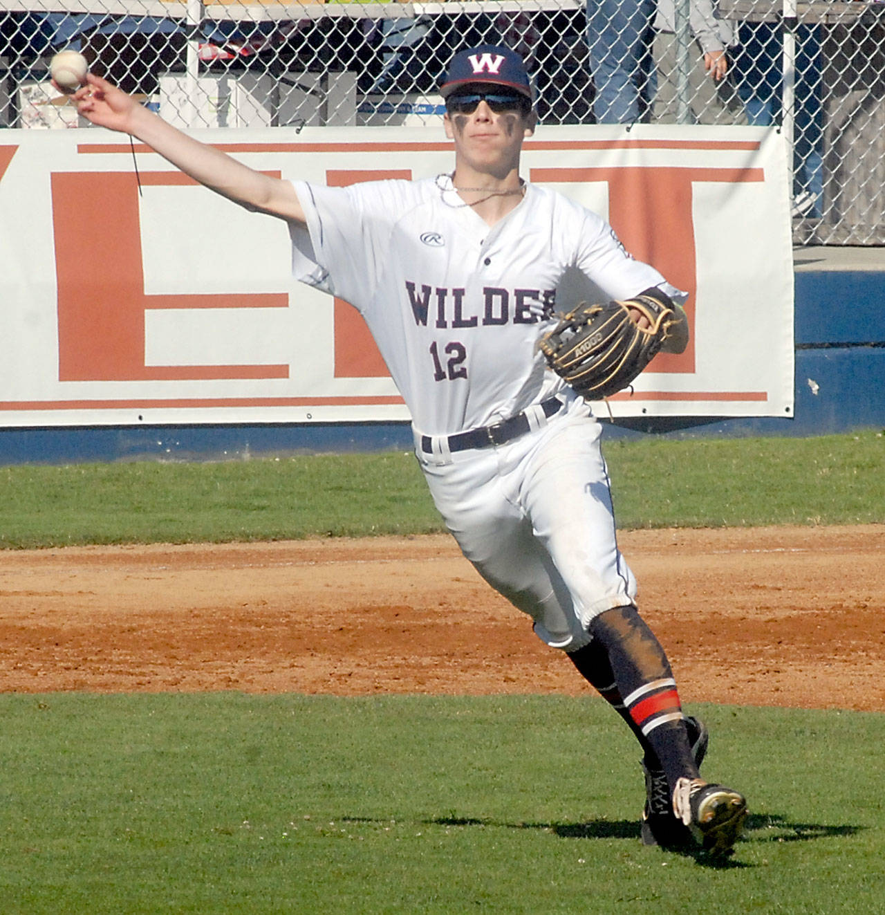 Wilder third baseman Landon Seibel makes a throw to first during Fridays game against Lakeside at Port Angeles Civic Field. (Keith Thorpe/Peninsula Daily News)