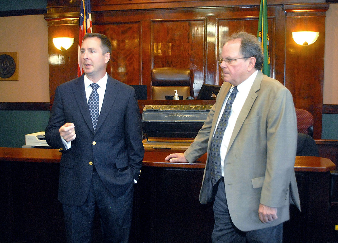 Clallam County Prosecuting Attorney Mark Nichols, left, talks about a proposed mental health court program accompanied by District Court Judge Dave Neupert on Tuesday at the Clallam County Courthouse in Port Angeles. (Keith Thorpe/Peninsula Daily News)
