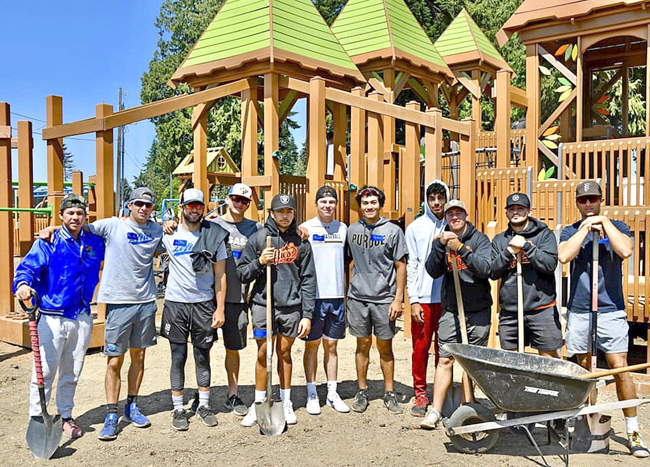 Members of the Port Angeles Lefties chipped in for four days last week to help build the new Generation II Dream Playground at Erickson Playfield across Race Street from Civic Field. Coach/owner Matt Acker said the players volunteered on their own to help out. “It’s something they’ll always remember,” he said. From left, are Lefties Takuto Kataoka, Nick Oakley, Justin Miller, Garrett Lake, Kai Staterstrom, Trevor Tishenkel, Tommy Takayoshi, Bryce Matthews, Luke Saunders, Richie Amavizca and Carson Crawford. (Chig Martin/Port Angeles Lefties)