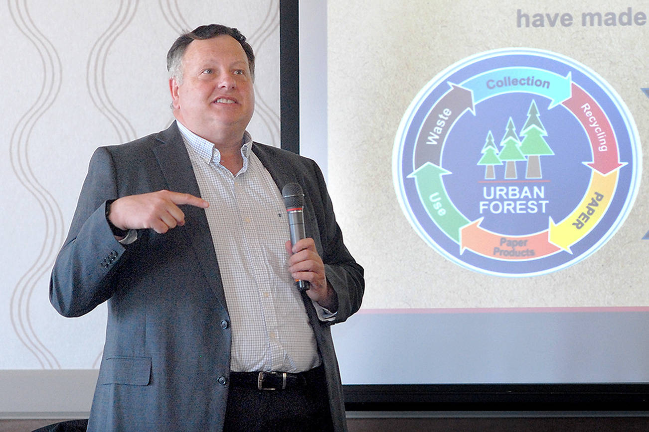 Peter Johnson, human resources manager for the McKinley Paper Co. mill in Port Angeles, talks about his company during Wednesday’s Port Angeles Chamber of Commerce luncheon. (Keith Thorpe/Peninsula Daily News)