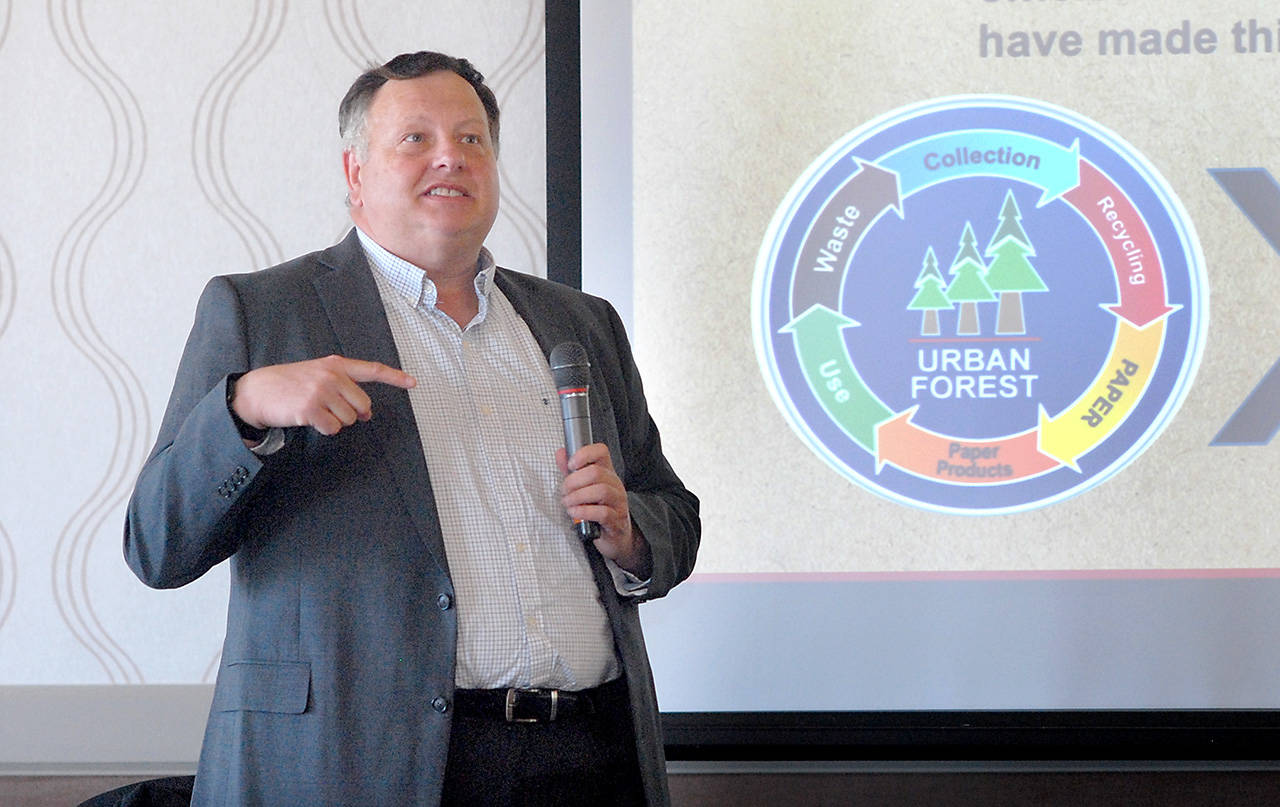 Peter Johnson, human resources manager for the McKinley Paper Co. mill in Port Angeles, talks about his company during Wednesday’s Port Angeles Chamber of Commerce luncheon. (Keith Thorpe/Peninsula Daily News)