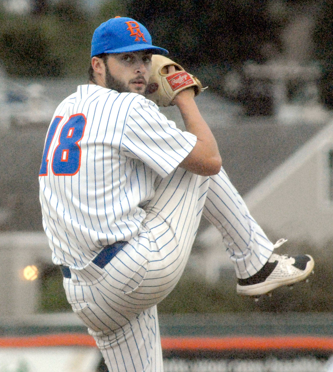 Lefties pitcher Justin Miller throws in the first inning against Walla Walla on Friday night at Port Angeles Civic Field. (Keith Thorpe/Peninsula Daily News)