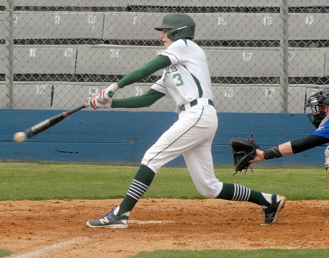 Port Angeles’ Landon Seibel bats in the third inning in a March 2021 game against North Mason at Port Angeles Civic Field. (Keith Thorpe/Peninsula Daily News)