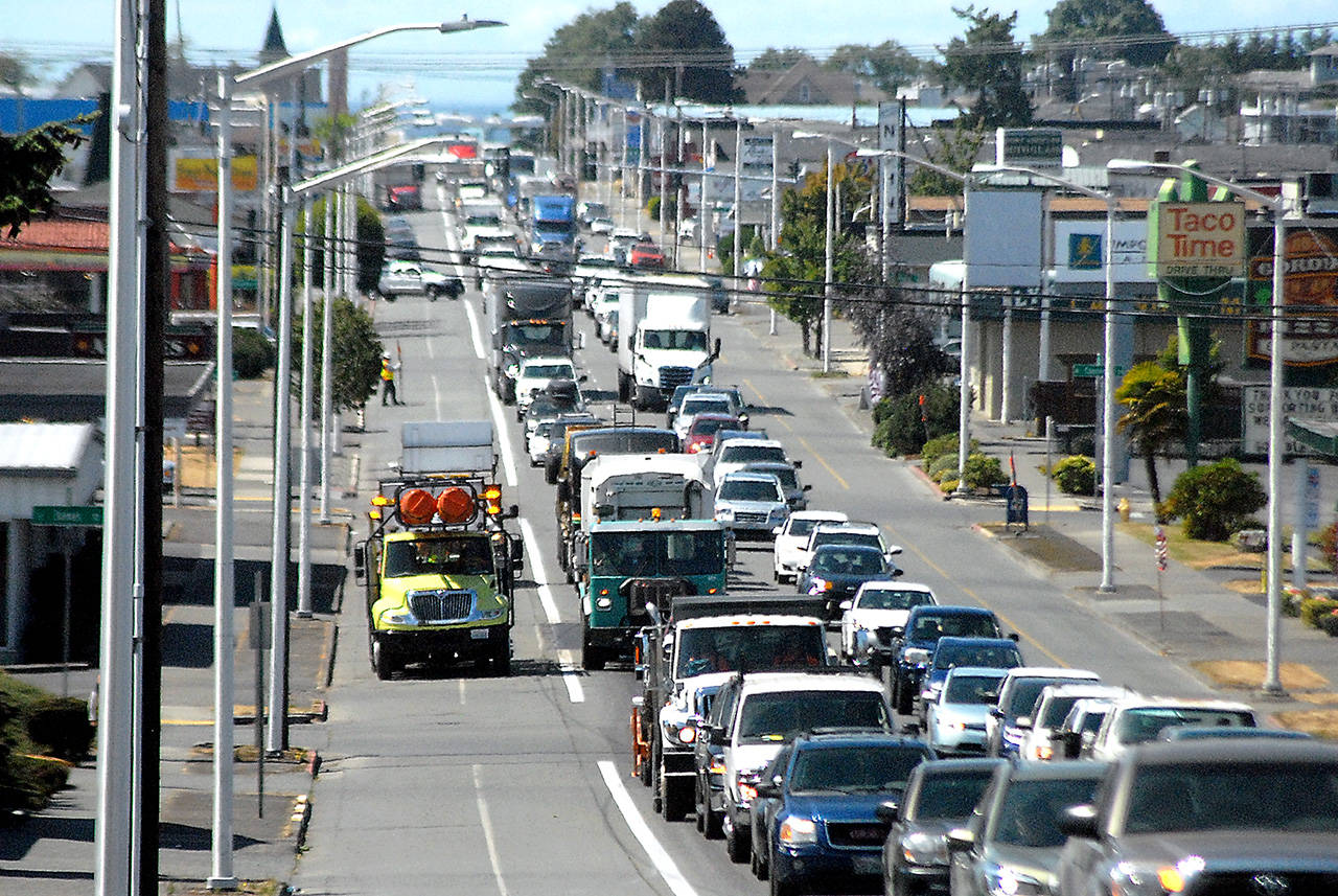Traffic backs up on East First Street in Port Angeles on Tuesday, the result of lane closures at Golf Course Road, which is being repaved from East First Street to East Fifth Street. At times, traffic was snarled as far as downtown Port Angeles with backups on many side streets and arterials. Construction on Golf Course is expected to continue through Friday. (Keith Thorpe/Peninsula Daily News)
