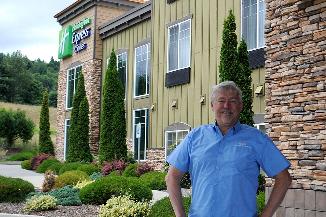Atop the Holiday Inn Express and Suites in Sequim, co-owner Bret Wirta recently learned he’d be able to keep his hotel after filing for Chapter 11 bankruptcy after the COVID-19 pandemic cut into tourism and his revenues. “I’m glad to have this cloud lifted from over us,” he said. (Matthew Nash/Olympic Peninsula News Group)
