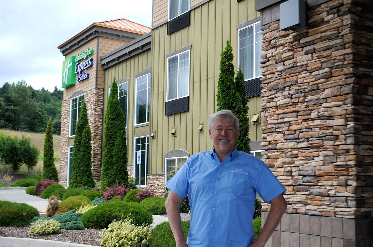 Atop the Holiday Inn Express and Suites in Sequim, co-owner Bret Wirta recently learned he’d be able to keep his hotel after filing for Chapter 11 bankruptcy after the COVID-19 pandemic cut into tourism and his revenues. “I’m glad to have this cloud lifted from over us,” he said. (Matthew Nash/Olympic Peninsula News Group)