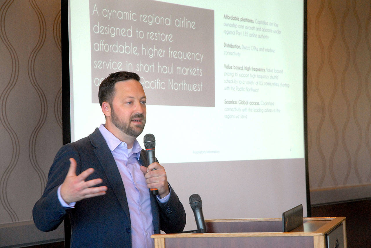 Clint Ostler, president of Dash Air Shuttle, speaks about starting air service between Port Angeles and Seattle-Tacoma International Airport during a Port Angeles Chamber of Commerce luncheon. (Keith Thorpe/Peninsula Daily News)