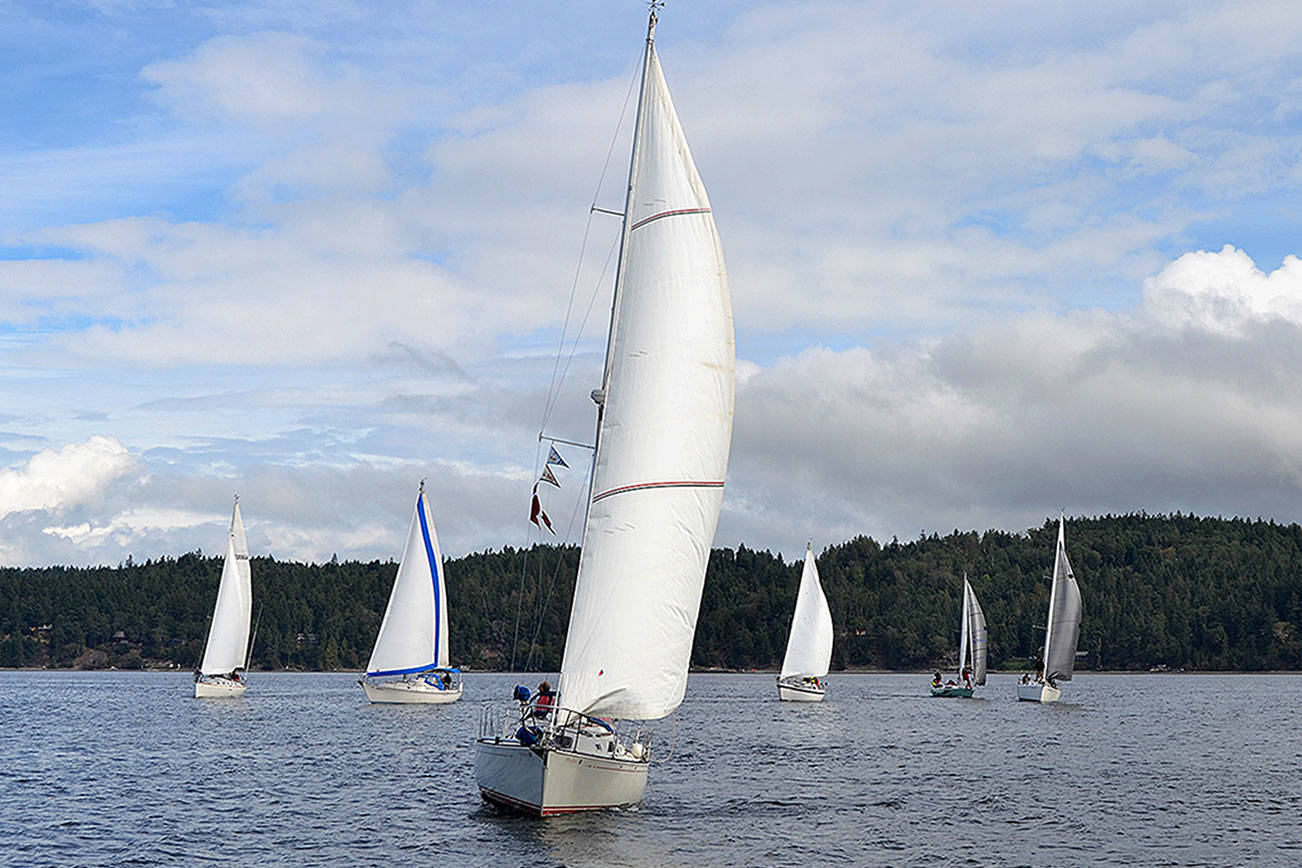 Boat captains and crew take to Sequim Bay for the Reach and Row for Hospice event in 2018. (Matthew Dash/Olympic Peninsula News Group)