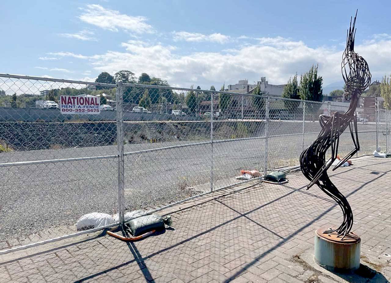 Several months have passed since work proceeded on the Lower Elwha Klallam Tribe’s downtown Port Angeles hotel, but the project passed a major hurdle when the tribe lowered the height. (Paul Gottlieb/Peninsula Daily News)