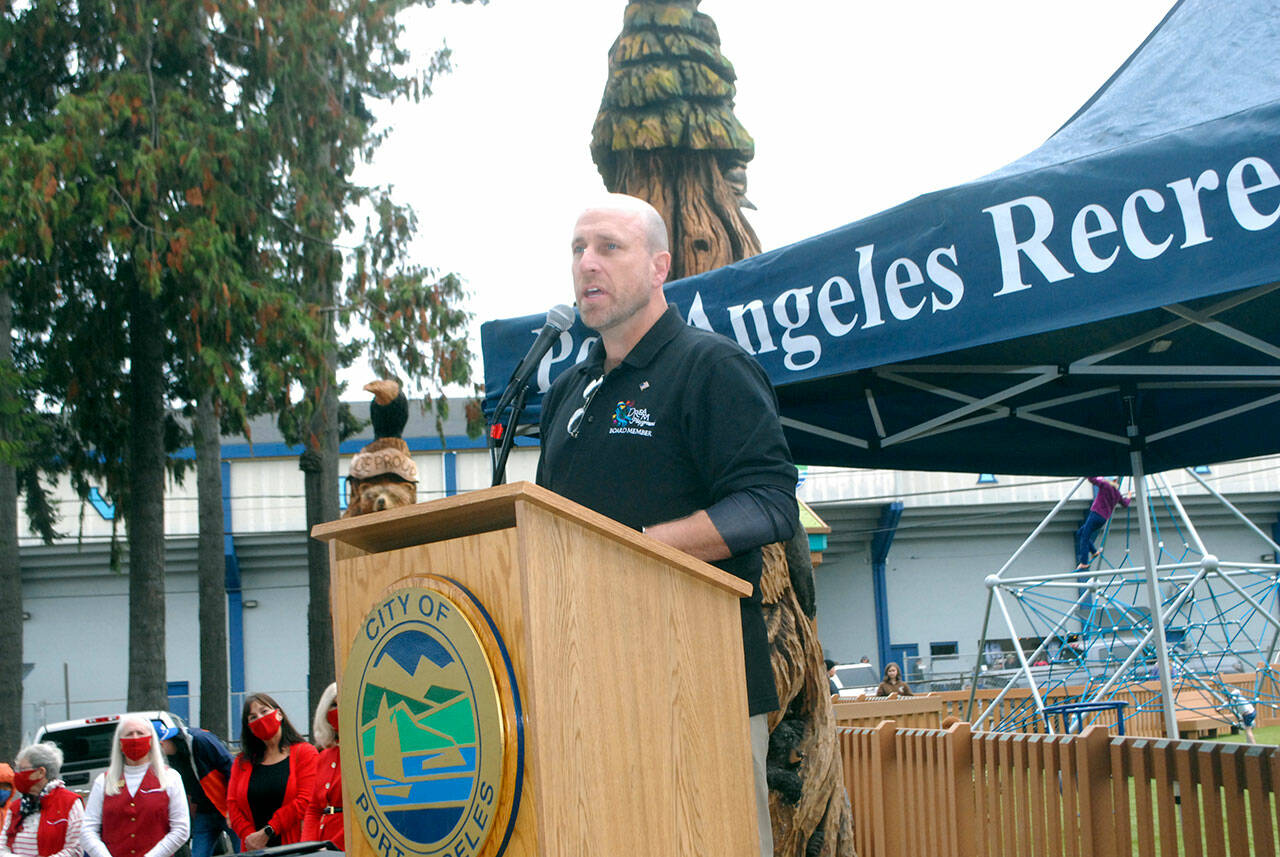 Dream Playground Foundation President Steve Methner speaks during the formal dedication of the Generation II Dream Playground at Erickson Playfield in Port Angeles. (Keith Thorpe/Peninsula Daily News)