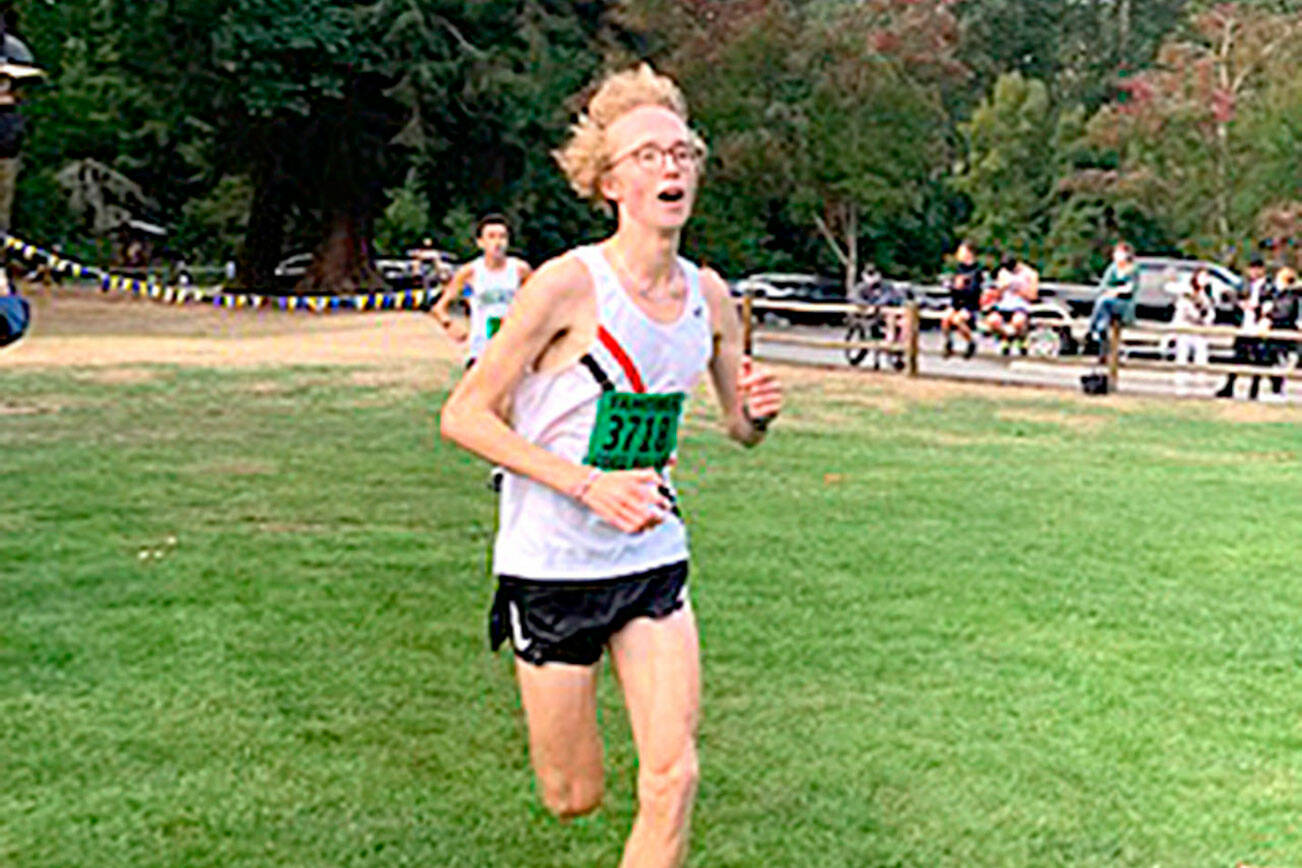 East Jefferson's Max Allworth-Miles runs at the Tahoma cross country race Saturday. Allworth-Miles led the team, finishing fifth in the boys' race. (Courtesy photo)