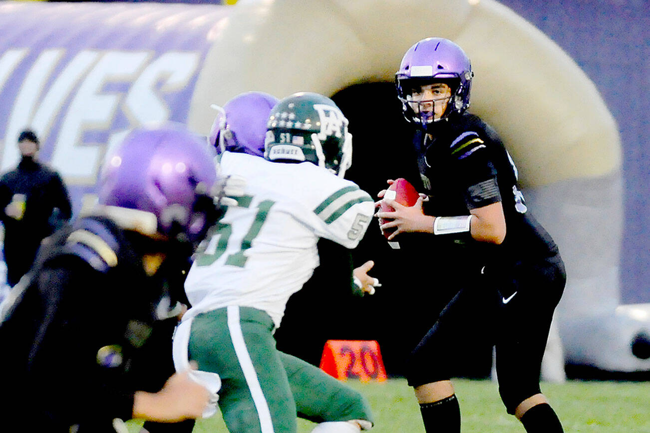 Michael Dashiell/Olympic Peninsula News Group
Sequim sophomore Lars Wiker made his first varsity start at quarterback during the Wolves' 17-12 rivalry victory over Port Angeles.