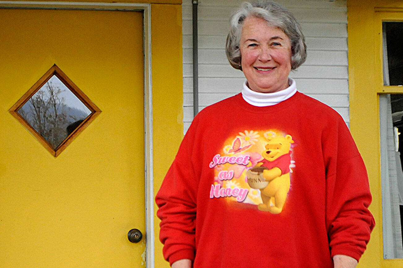 Every few months, Cathie Osborne will meet with her doctor at Swedish Medical Center via Zoom and, with a magnet and cell phone, her treatment for essential tremor can be adjusted remotely by medical staff in Seattle without making an all-day trip. “Knowing we don’t have to make those trips is such a relief,” she said. (Matthew Nash/Olympic Peninsula News Group)=