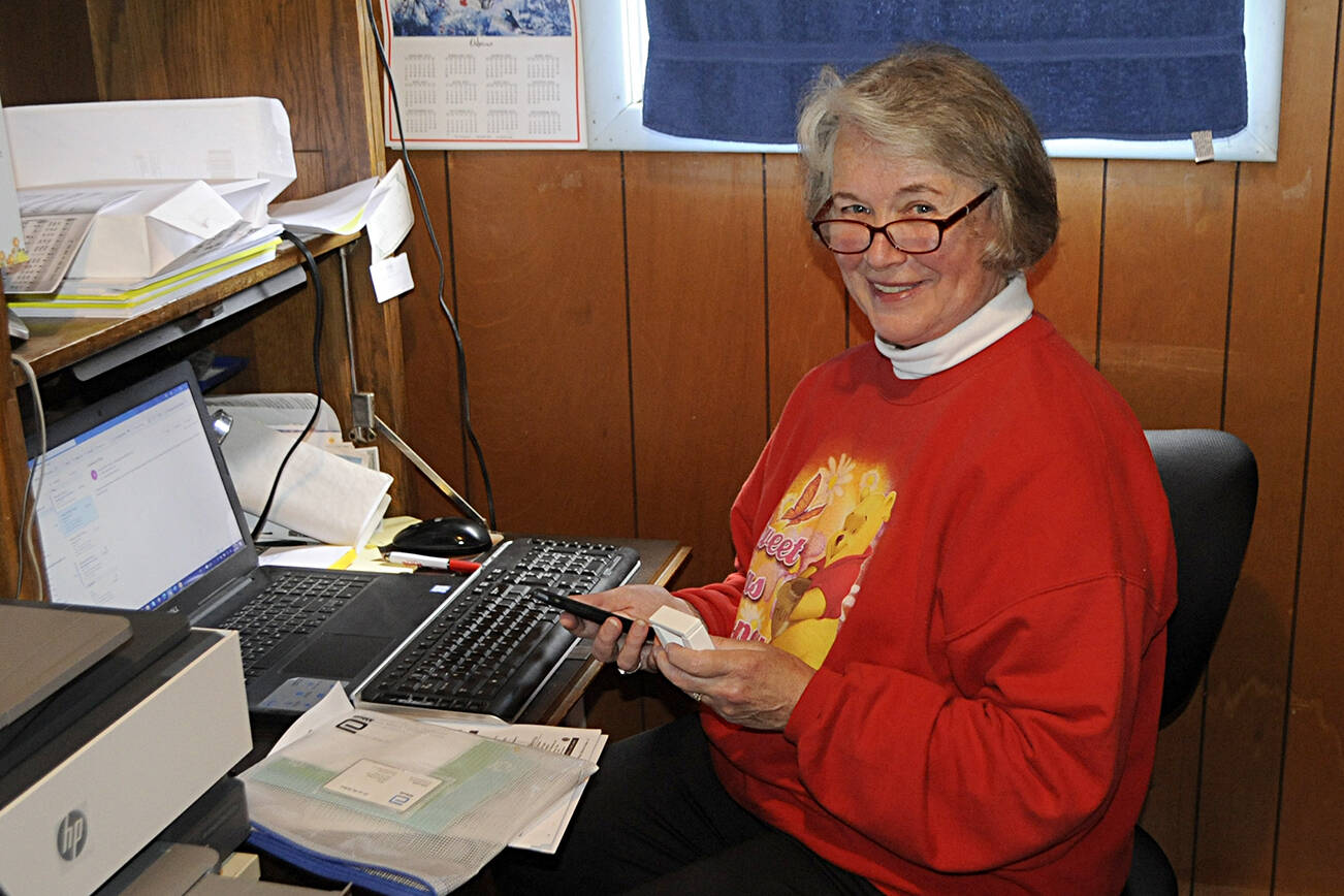 Every few months, Cathie Osborne will meet with her doctor at Swedish Medical Center via Zoom and, with a magnet and cell phone, her treatment for essential tremor can be adjusted remotely by medical staff in Seattle without making an all-day trip. “Knowing we don’t have to make those trips is such a relief,” she said. (Matthew Nash/Olympic Peninsula News Group)=