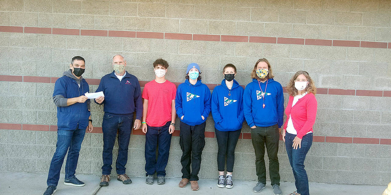 Pictured, left to right, are Shawn Close, head pharmacist at Jim’s; and boating program members Randy Volker, Elliot Dahlin, Jonathan Bridges, Fern Knobel, Eric Lesch and Erika Hansen-Dahlin.