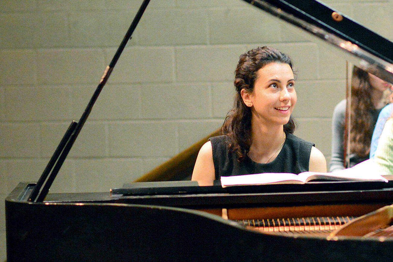 Bulgarian-born pianist Anna Petrova, rehearsing with the Port Angeles Symphony the last time she came to the North Olympic Peninsula, will return to open the orchestra’s new season Nov. 6. (Diane Urbani de la Paz/Peninsula Daily News)