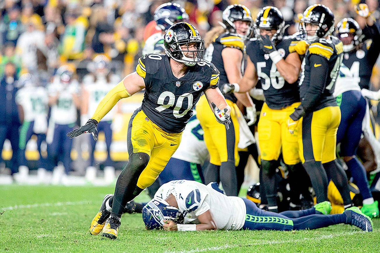 Pittsburgh Steelers outside linebacker T.J. Watt (90) celebrates after a strip sack for fumble during an NFL football game, Sunday, Oct. 17, 2021 in Pittsburgh. (AP Photo/Matt Durisko)