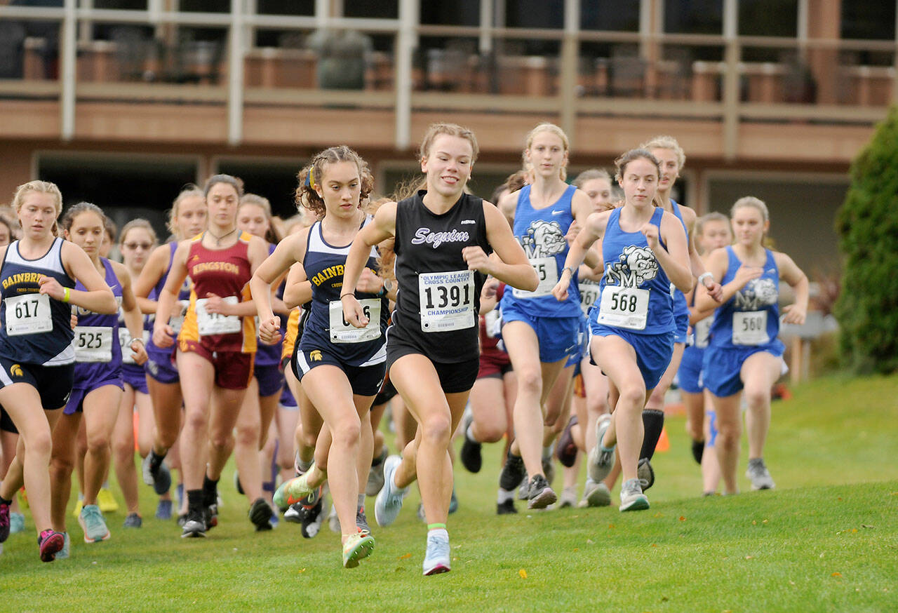Sequim’s Riley Pyeatt was all smiles at the start of the Olympic League Cross Country Championships at The Cedars at Dungeness Golf Course on Thursday. (Michael Dashiell/Olympic Peninsula News Group)