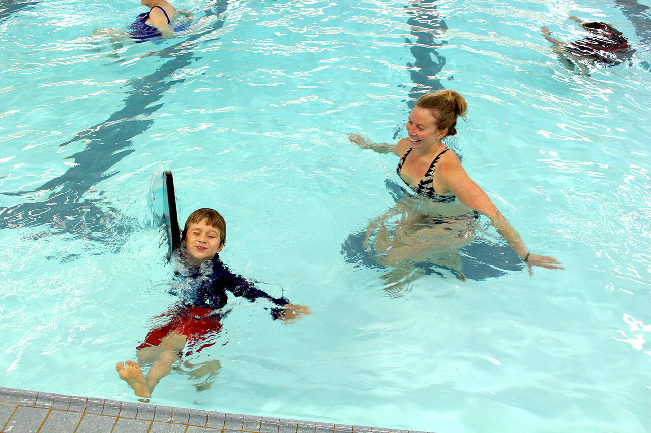 Port Townsend residents Corbin Meyers, 5, and his mother Laura enjoy the Mountain View Pool in Port Townsend on Tuesday morning. The pool reopened to the public on Monday. (Zach Jablonski/Peninsula Daily News)