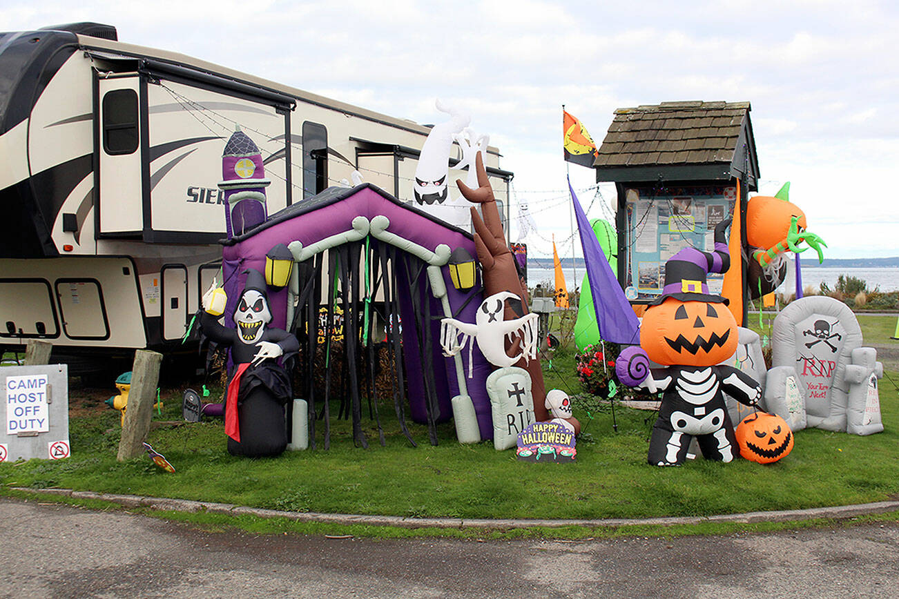 The camp host for the Point Hudson campground has their corner of the RV park decorated for Halloween. While many annual Halloween events have been cancelled this year due to the continuing COVID-19 pandemic, the health officer for North Olympic Peninsula believes that normal trick-or-treating for kids can be done safely tonight. (Zach Jablonski/Peninsula Daily News)