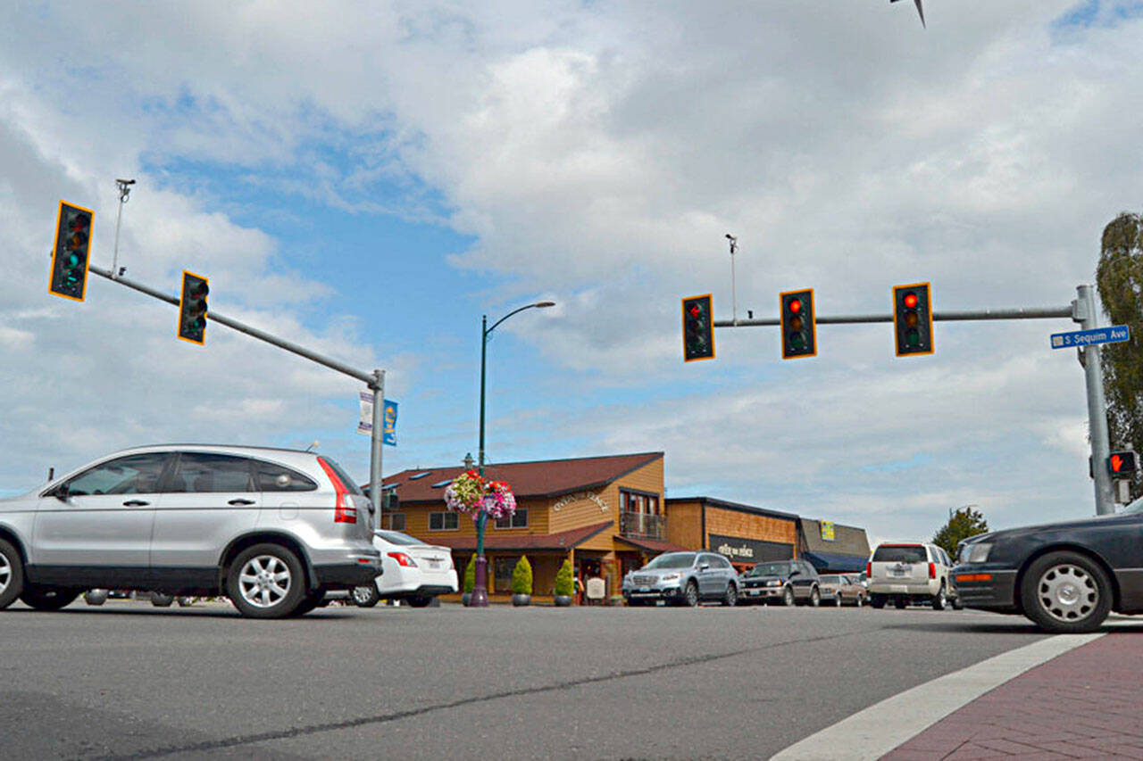 With only one bid for construction and an estimate almost double city staff’s anticipated expenses, Sequim city councilors voted down a plan to replace traffic lights along Washington Street at the Sequim and Third Avenue intersections. Matthew Nash/Olympic Peninsula News Group