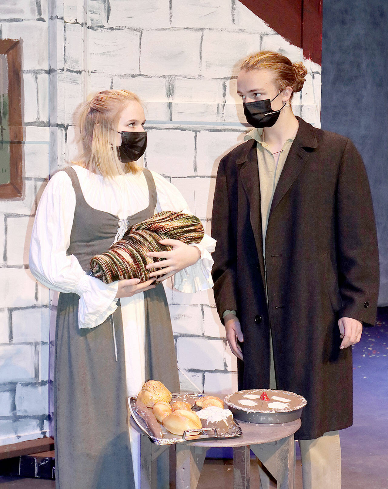 Abby Sanford and Aidan Butterworth portray the couple at the center of “Into the Woods,” the Stephen Sondheim musical opening tonight at the Port Angeles High School Performing Arts Center. (Dave Logan/for Peninsula Daily News)