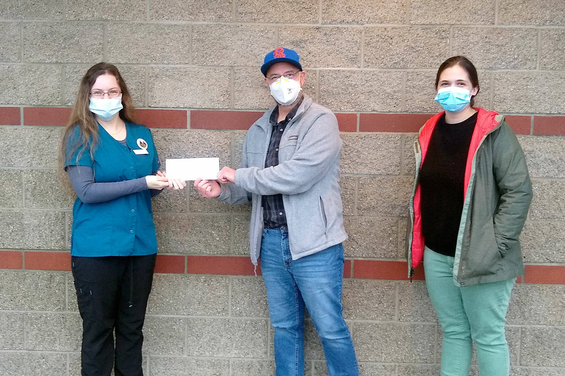 Pictured, from left, are Renée Buehler, Scott Brandon and Helen Kenoyer.