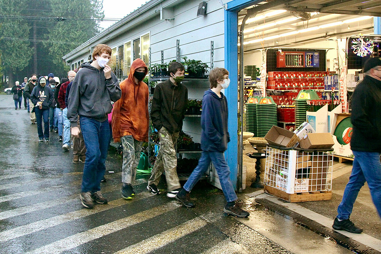 Dave Logan/for Peninsula Daily news 

About 50 early and eager shoppers were at the Port Angeles Swain’s General Store’s door at 8 a.m. sharp Friday morning to get Black Friday holiday deals. Retailers throughout the North Olympic Peninsula offered special sales on Friday and Saturday during the long Thanksgiving weekend.