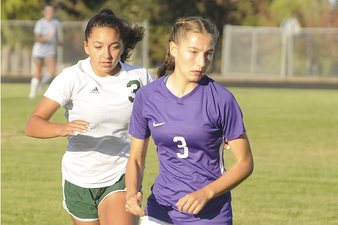 Sequim's Taryn Johnson (right), who scored 24 goals for the Wolves this season as a sophomore, made the All-Peninsula Girls Soccer team. (Michael Dashiell/Olympic Peninsula News Group)