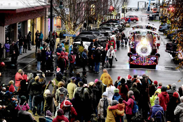 The Kiwanis Choo Choo pulled onto Taylor Street in downtown Port Townsend for the community Christmas tree lighting Saturday evening. The lighted, horn-sounding train will make another appearance in Uptown and downtown Port Townsend this coming Saturday. (Diane Urbani de la Paz/Peninsula Daily News)