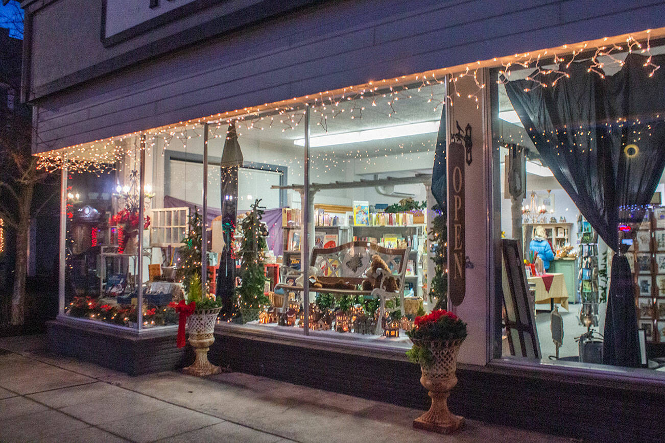 The exterior of the newly re-opened Pacific Mist reveals some of the contents of the book, gift and card store. Emily Matthiessen/Olympic Peninsula News Group