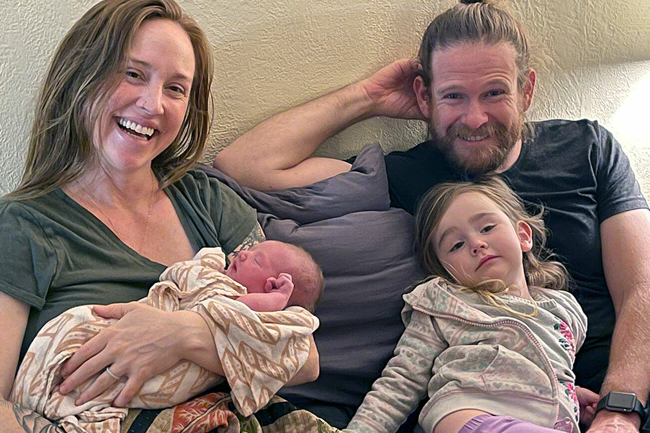 Indie Bo Bruner was born at home to Laura and Rusty Bruner of Port Angeles at 2:44 a.m. New Year’s Day. She is seen here soon after the birth with her older sister, Evie Wilder Bruner, by her side. (Mallorie Kirsch, LM CPM)